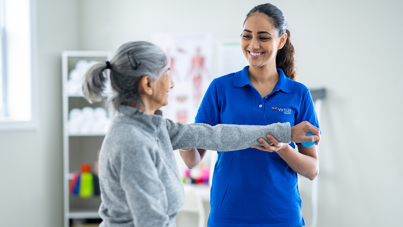 Physical Therapist working with a patient